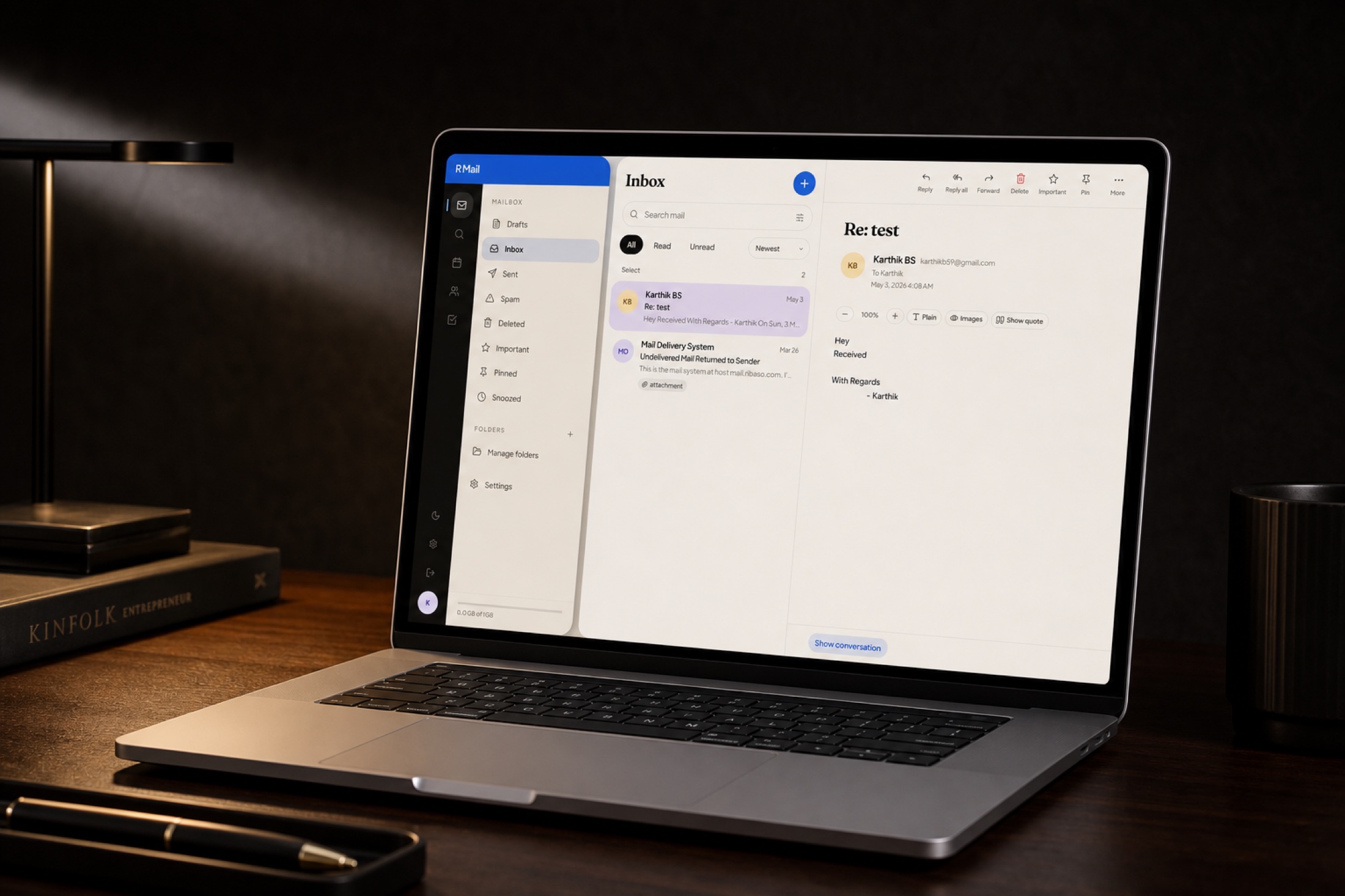R Mail open on a laptop in a dark brokerage office